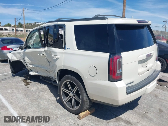 2015 GMC Yukon SLT with VIN 1GKS1BKC3FR102961, listed as a IAAI auction lot 41872717 with 1 mi miles. Bid and sale history available at carsss.com. Image 3.