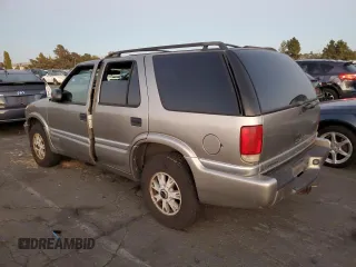 2000 GMC Jimmy SLE Convenience with VIN 1GKDT13WXY2158025, listed as a Copart auction lot 73565954 with 0 mi miles and Salvage Title. Bid and sale history available at carsss.com. Image 2.