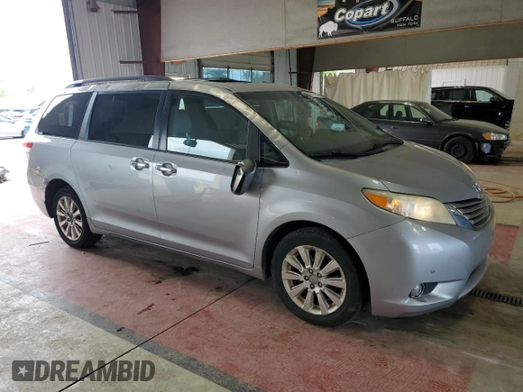 2011 Toyota Sienna XLE with VIN 5TDDK3DC7BS022837, listed as a Copart auction lot 60811445 with 210,732 mi miles and Salvage title. Bid and sale history available at DreamBid. Image 4.