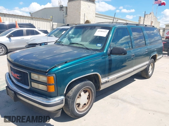 1995 GMC Suburban z VIN 1GKEC16KXSJ712111, wystawiony jako IAAI lot #42185423 z przebiegiem 269 010 mil mil oraz . Historia ofert i sprzedaży dostępna na DreamBid. Obrazek 2.