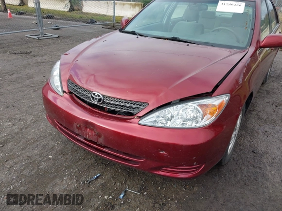 2004 Toyota Camry LE with VIN 4T1BF32K74U069737, listed as a IAAI auction lot 41746236 with 48,026 mi miles. Bid and sale history available at carsss.com. Image 6.