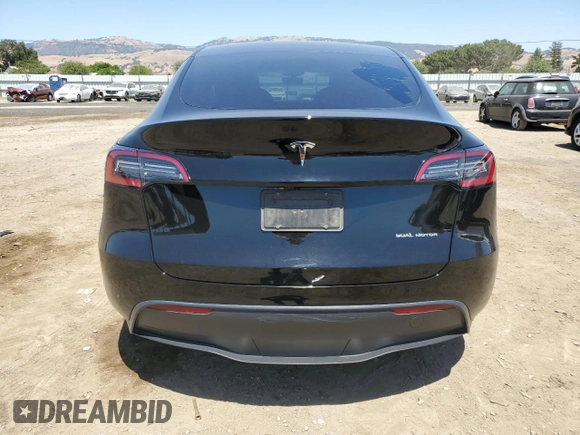 2024 Tesla Model Y Long Range with VIN 7SAYGAEE9RF125458, listed as a Copart auction lot 59567365 with 28,966 mi miles and Salvage title. Bid and sale history available at DreamBid. Image 6.