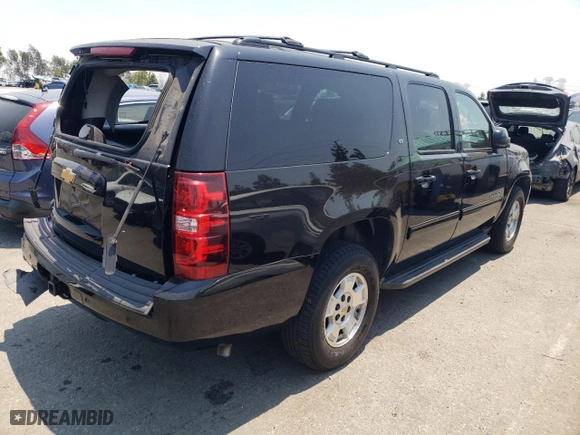 2014 Chevrolet Suburban LT with VIN 1GNSKJE74ER200677, listed as a Copart auction lot 62510114 with 249,578 mi miles and Salvage Title. Bid and sale history available at carsss.com. Image 3.