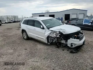 2022 Jeep Grand Cherokee Laredo E z VIN 1C4RJFAG4NC162335, wystawiony jako Copart lot #54987855 z przebiegiem 59 952 mil mil oraz Szkoda całkowita • Salvage title. Historia ofert i sprzedaży dostępna na DreamBid. Obrazek 14.