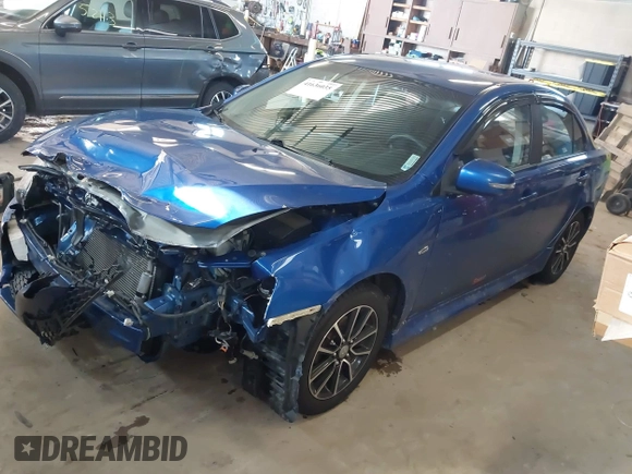 2017 Mitsubishi Lancer ES with VIN JA32V2FW4HU006890, listed as a IAAI auction lot 41636035 with 165,077 mi miles. Bid and sale history available at carsss.com. Image 17.