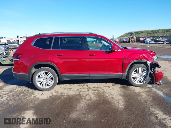 2018 Volkswagen Atlas SEL Premium with VIN 1V2NR2CAXJC532205, listed as a IAAI auction lot 41598269 with 122,975 mi miles and . Bid and sale history available at DreamBid. Image 13.