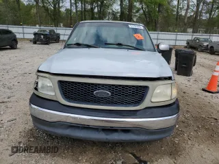 2000 Ford F-150 XL with VIN 1FTRX07W3YKA40036, listed as a Copart auction lot 51795085 with Not provided miles and Salvage title. Bid and sale history available at DreamBid. Image 5.