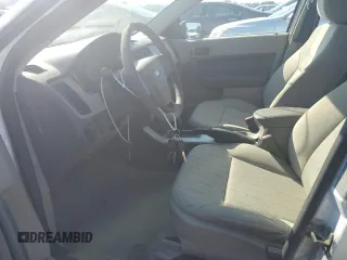 2008 Ford Focus SE z VIN 1FAHP35N18W246817, wystawiony jako Copart lot #68275004 z przebiegiem 261 765 mil mil oraz Czysty tytuł • Clean title. Historia ofert i sprzedaży dostępna na DreamBid. Obrazek 7.