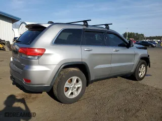 2015 Jeep Grand Cherokee Laredo with VIN 1C4RJFAG4FC675506, listed as a Copart auction lot 54562815 with 112,898 mi miles and Clean Title. Bid and sale history available at carsss.com. Image 3.