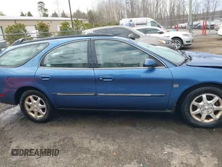 2002 Mercury Sable LS Premium with VIN 1MEHM59S02A614938, listed as a IAAI auction lot 41640570 with 86,549 mi miles and . Bid and sale history available at DreamBid. Image 13.