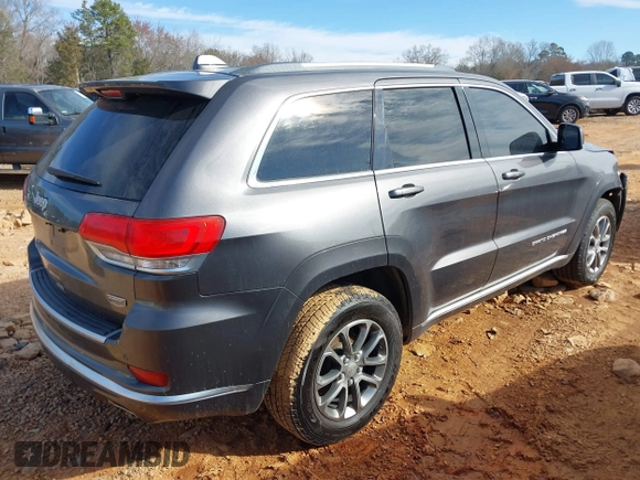 2015 Jeep Grand Cherokee Summit with VIN 1C4RJFJG8FC679185, listed as a IAAI auction lot 41653531 with 158,186 mi miles and . Bid and sale history available at DreamBid. Image 4.