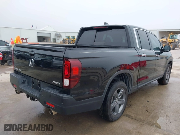 2022 Honda Ridgeline RTL-E with VIN 5FPYK3F75NB020036, listed as a IAAI auction lot 41500206 with 79,655 mi miles and . Bid and sale history available at DreamBid. Image 4.