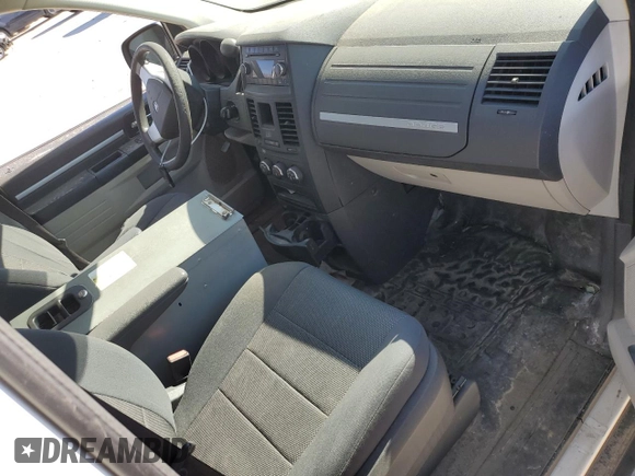 2009 Dodge Grand Caravan Cargo with VIN 2D4HN11EX9R689670, listed as a Copart auction lot 49794435 with 254,622 mi miles and Salvage Title. Bid and sale history available at carsss.com. Image 8.