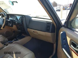 2001 Jeep Cherokee Sport with VIN 1J4FF58S41L619254, listed as a IAAI auction lot 41596384 with 180,826 mi miles and . Bid and sale history available at DreamBid. Image 5.