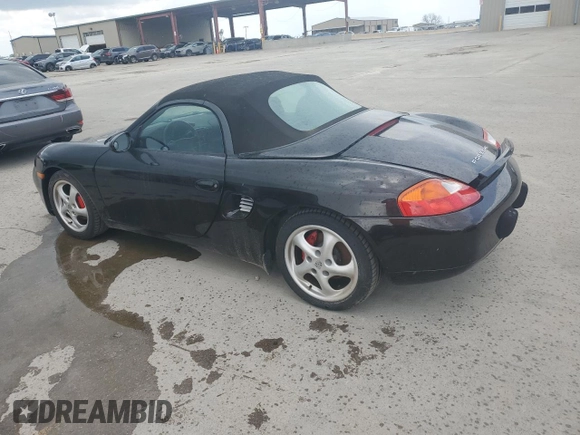 1998 Porsche Boxster с VIN WP0CA2982WU620882, выставлен на аукционе Copart как лот 50950515 с пробегом Не указан миль и Списание • Salvage title. История ставок и продаж доступна на DreamBid. Изображение 2.