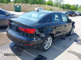 2015 Audi A3 Premium with VIN WAUAJGFF8F1067354, listed as a IAAI auction lot 42173445 with 94,325 mi miles and . Bid and sale history available at DreamBid. Image 4.