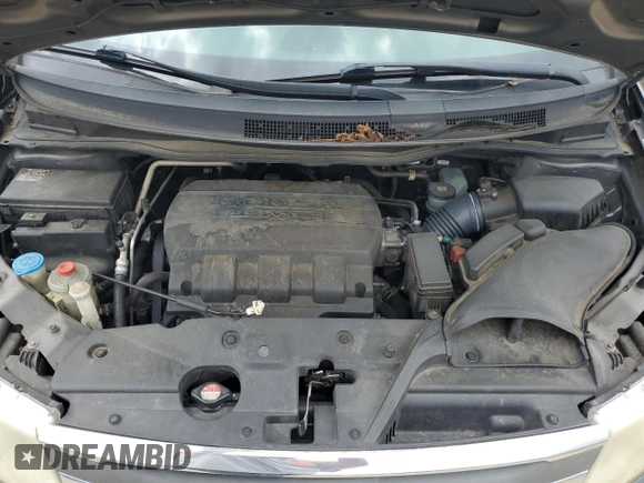 2012 Honda Odyssey Touring with VIN 5FNRL5H90CB050580, listed as a Copart auction lot 58502925 with 226,929 mi miles and Salvage title. Bid and sale history available at DreamBid. Image 12.