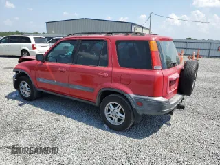 2000 Honda CR-V EX with VIN JHLRD1863YC028317, listed as a Copart auction lot 69479084 with 309,824 mi miles and Salvage Title. Bid and sale history available at carsss.com. Image 2.
