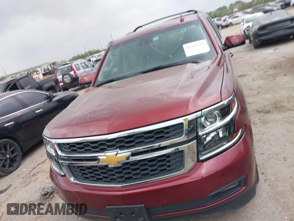 2020 Chevrolet Suburban LT z VIN 1GNSCHKC9LR233596, wystawiony jako IAAI lot #41943325 z przebiegiem 97 515 mil mil oraz . Historia ofert i sprzedaży dostępna na DreamBid. Obrazek 6.