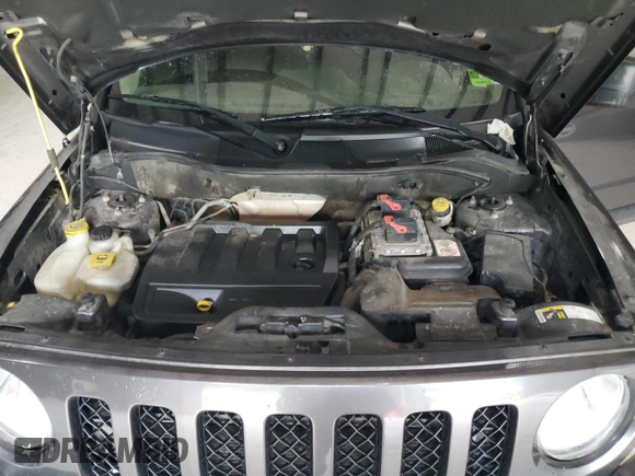 2015 Jeep Patriot Sport with VIN 1C4NJRBB5FD240460, listed as a Copart auction lot 54054755 with 148,502 mi miles and Salvage title. Bid and sale history available at DreamBid. Image 12.