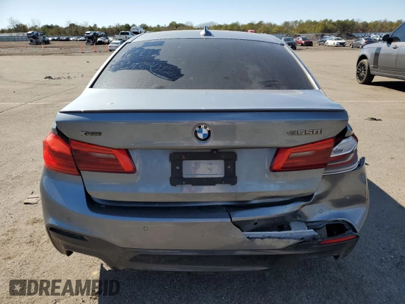 2018 BMW 5 Series M550i xDrive z VIN WBAJB9C55JB036120, wystawiony jako Copart lot #49134865 z przebiegiem Nie podano mil oraz Szkoda całkowita • Salvage title. Historia ofert i sprzedaży dostępna na DreamBid. Obrazek 6.