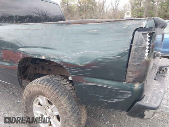 2004 Chevrolet Silverado 1500 LS with VIN 1GCEC19V54Z341512, listed as a IAAI auction lot 41930609 with 176,859 mi miles. Bid and sale history available at carsss.com. Image 13.
