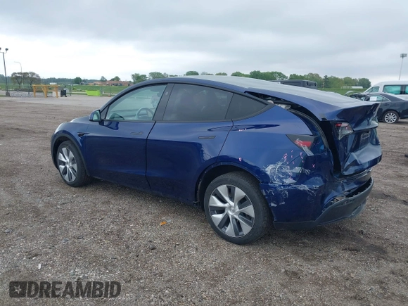 2023 Tesla Model Y Long Range z VIN 7SAYGDEE0PF840787, wystawiony jako IAAI lot #42172489 z przebiegiem 16 314 mil mil oraz . Historia ofert i sprzedaży dostępna na DreamBid. Obrazek 3.