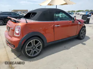 2014 MINI Roadster S z VIN WMWSY3C54ET595156, wystawiony jako Copart lot #68507474 z przebiegiem 43 608 mil mil oraz Tytuł czysty. Historia ofert i sprzedaży dostępna na DreamBid. Obrazek 3.