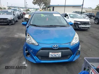 2015 Toyota Prius One z VIN JTDKDTB34F1111966, wystawiony jako IAAI lot #42382889 z przebiegiem 75 896 mil mil oraz . Historia ofert i sprzedaży dostępna na DreamBid. Obrazek 13.