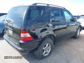 1998 Mercedes-Benz M-Class with VIN 4JGAB54E9WA019694, listed as a IAAI auction lot 41891982 with 282,454 mi miles. Bid and sale history available at carsss.com. Image 4.