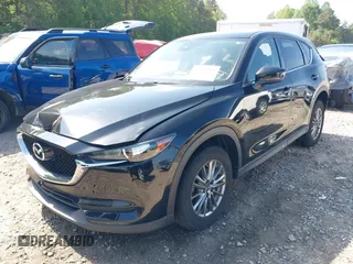 2017 Mazda CX-5 Touring z VIN JM3KFBCL0H0209458, wystawiony jako IAAI lot #42169599 z przebiegiem 93 287 mil mil oraz . Historia ofert i sprzedaży dostępna na DreamBid. Obrazek 18.