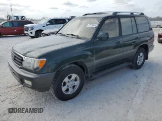 1999 Toyota Land Cruiser with VIN JT3HT05J9X0027448, listed as a Copart auction lot 77175814 with 0 mi miles and Salvage Title. Bid and sale history available at carsss.com. Image 1.