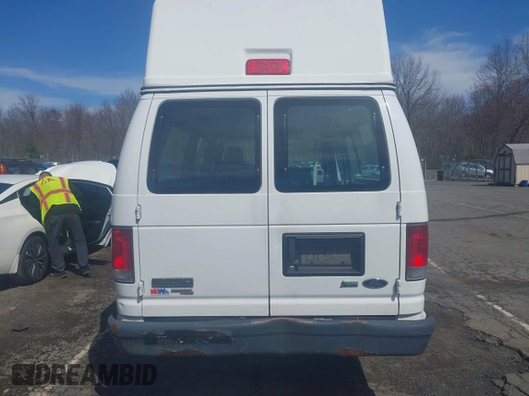 2014 Ford Econoline Cargo Commercial with VIN 1FTNS2EW7EDA67834, listed as a IAAI auction lot 42026939 with 138,501 mi miles. Bid and sale history available at carsss.com. Image 16.