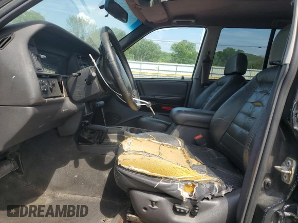 1998 Jeep Grand Cherokee Laredo with VIN 1J4GZ48S7WC222845, listed as a Copart auction lot 59576115 with Not provided miles and Clean title. Bid and sale history available at DreamBid. Image 7.