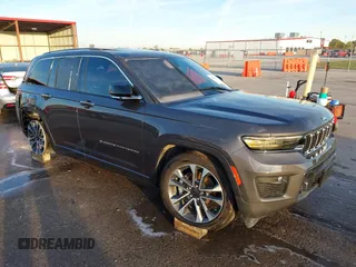 2023 Jeep Grand Cherokee Overland with VIN 1C4RJHDGXP8864365, listed as a IAAI auction lot 40502141 with 3,911 mi miles and . Bid and sale history available at DreamBid. Image 1.