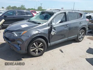 2018 Toyota RAV4 XLE z VIN 2T3WFREV8JW499399, wystawiony jako IAAI lot #42038421 z przebiegiem 77 411 mil mil oraz . Historia ofert i sprzedaży dostępna na DreamBid. Obrazek 16.