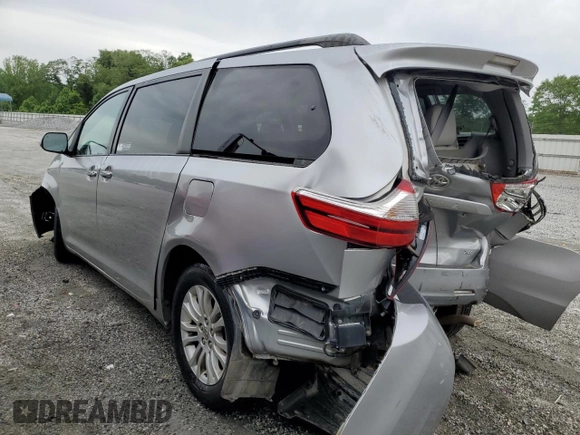 2015 Toyota Sienna XLE с VIN 5TDYK3DC7FS571431, выставлен на аукционе Copart как лот 57173595 с пробегом 305 940 миль миль и Списание • Salvage title. История ставок и продаж доступна на DreamBid. Изображение 2.