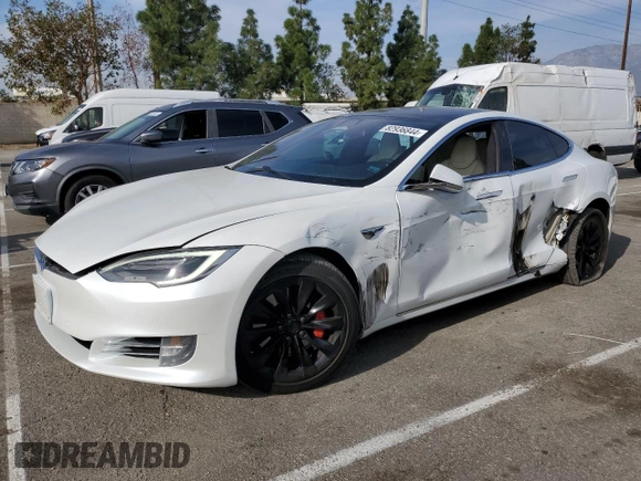 2019 Tesla Model S 100D with VIN 5YJSA1E44KF335113, listed as a Copart auction lot 82936844 with 89,770 mi miles and Salvage title. Bid and sale history available at DreamBid. Image 1.