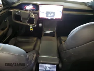 2021 Tesla Model S Long Range with VIN 5YJSA1E51MF429302, listed as a Copart auction lot 58242465 with 148,472 mi miles and Salvage title. Bid and sale history available at DreamBid. Image 8.