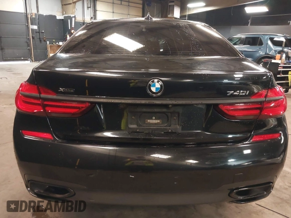 2018 BMW 7 Series 740i xDrive z VIN WBA7E4C51JGV24133, wystawiony jako IAAI lot #42253139 z przebiegiem 77 370 mil mil oraz . Historia ofert i sprzedaży dostępna na DreamBid. Obrazek 16.