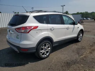 2013 Ford Escape SEL z VIN 1FMCU9H95DUD59797, wystawiony jako Copart lot #59533335 z przebiegiem 129 637 mil mil oraz Szkoda całkowita • Salvage title. Historia ofert i sprzedaży dostępna na DreamBid. Obrazek 3.