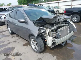 2015 Nissan Versa SV with VIN 3N1CN7APXFL830101, listed as a IAAI auction lot 41952806 with 144,354 mi miles. Bid and sale history available at carsss.com. Image 1.