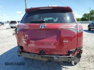 2018 Toyota RAV4 XLE with VIN 2T3WFREV5JW407777, listed as a Copart auction lot 58156275 with 119,447 mi miles and Salvage title. Bid and sale history available at DreamBid. Image 6.