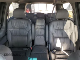 2010 Honda Odyssey EX-L z VIN 5FNRL3H75AB067634, wystawiony jako Copart lot #51538755 z przebiegiem 150 261 mil mil oraz Szkoda całkowita • Salvage title. Historia ofert i sprzedaży dostępna na DreamBid. Obrazek 10.