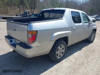 2007 Honda Ridgeline RTL w/Leather with VIN 2HJYK16557H550091, listed as a IAAI auction lot 42065256 with 209,166 mi miles. Bid and sale history available at carsss.com. Image 4.