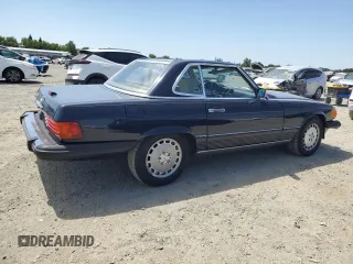 1988 Mercedes-Benz 560 SL z VIN WDBBA48D3JA079534, wystawiony jako Copart lot #58096985 z przebiegiem 83 732 mil mil oraz Tytuł czysty. Historia ofert i sprzedaży dostępna na DreamBid. Obrazek 3.