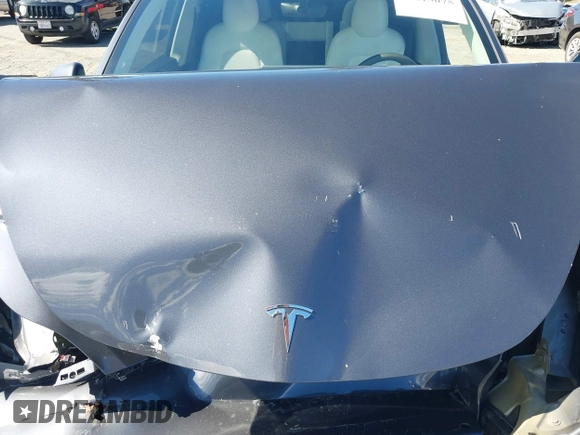 2022 Tesla Model Y Long Range with VIN 7SAYGAEEXNF381389, listed as a IAAI auction lot 41613075 with 52,800 mi miles and . Bid and sale history available at carsss.com. Image 10.