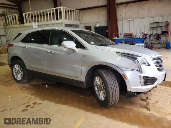 2019 Cadillac XT5 FWD with VIN 1GYKNARS1KZ231504, listed as a Copart auction lot 51952355 with 54,243 mi miles and Salvage title. Bid and sale history available at DreamBid. Image 4.