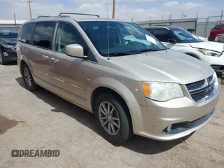 2014 Dodge Grand Caravan SXT with VIN 2C4RDGCG6ER466459, listed as a IAAI auction lot 41820907 with 105,404 mi miles and . Bid and sale history available at DreamBid. Image 1.