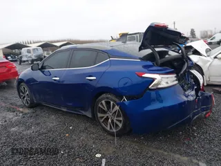 2016 Nissan Maxima SL with VIN 1N4AA6APXGC396890, listed as a IAAI auction lot 41594044 with 144,164 mi miles and . Bid and sale history available at DreamBid. Image 3.
